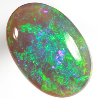 SOLID BLACK CRYSTAL OPAL Bright sparkling greens  SEE VIDEO